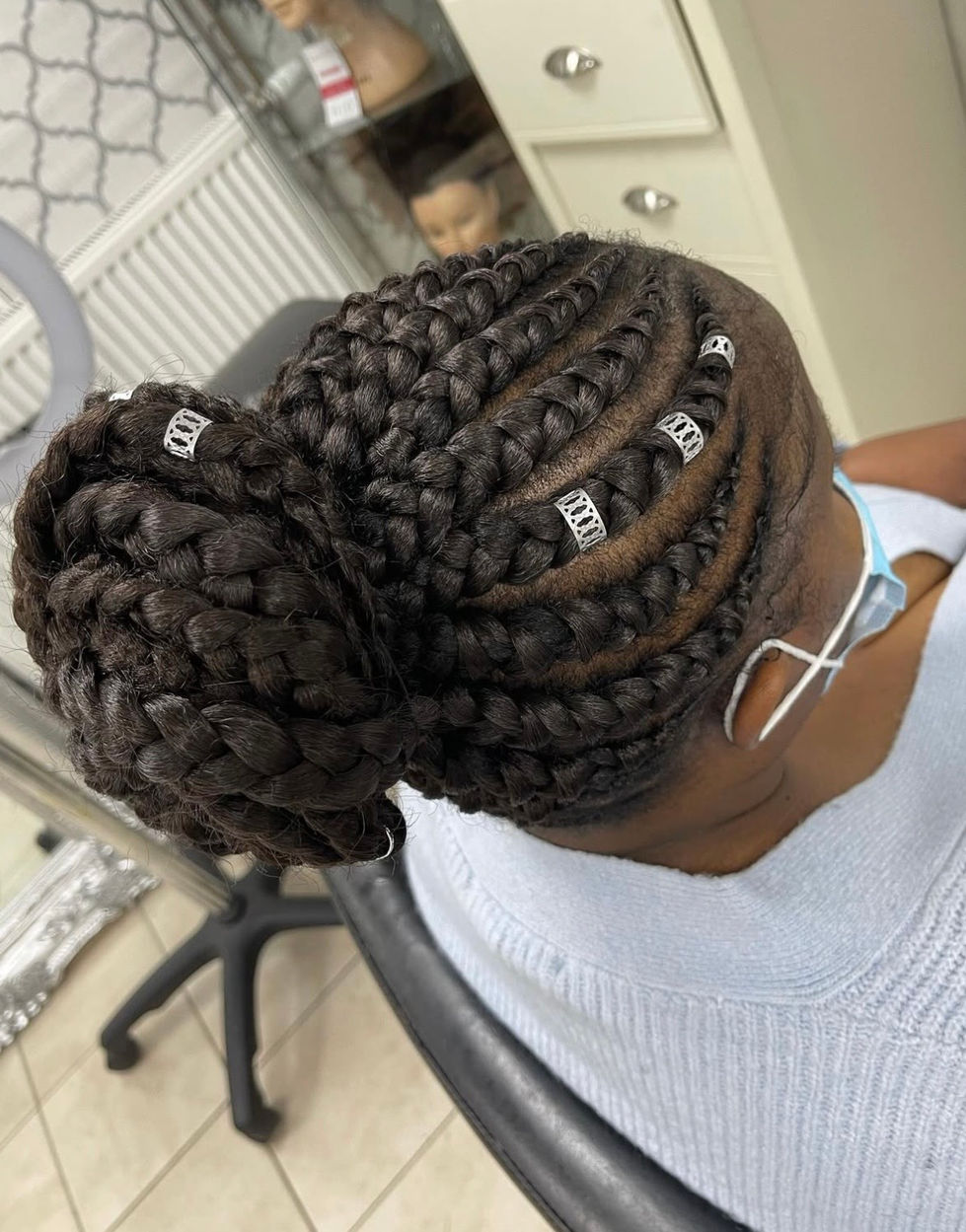 Ghana weaving ponytail bun with silver cuffs and beads at Eestelia Hair Salon Dalkeith Edinburgh — Ghana braids styling