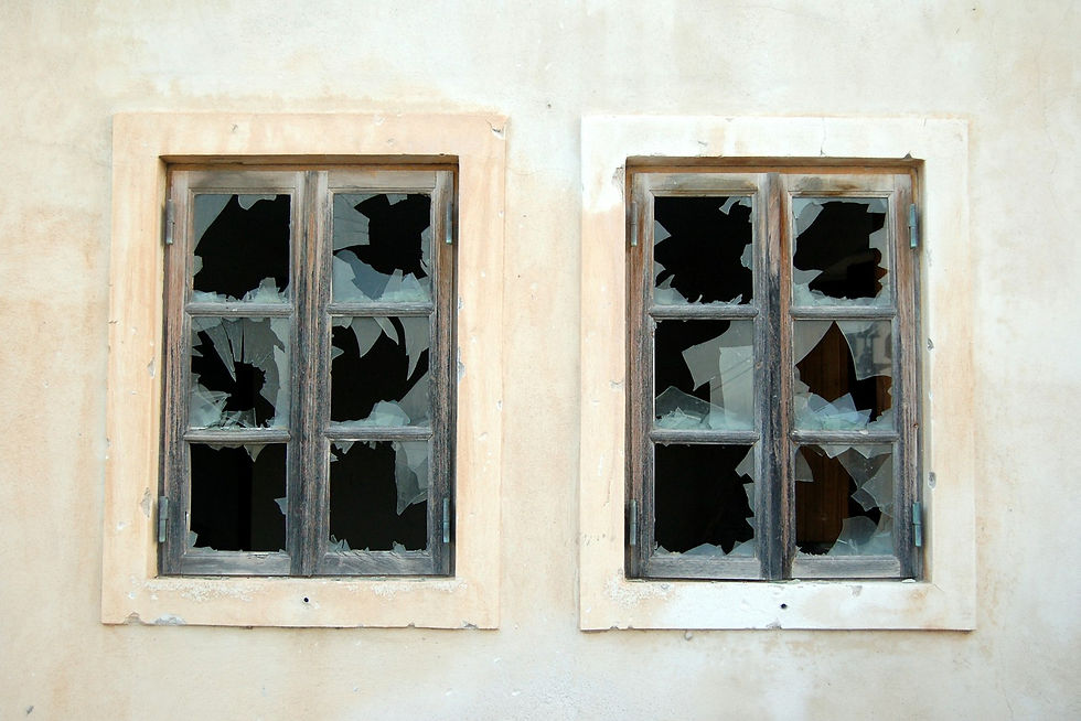 Damaged or boarded window