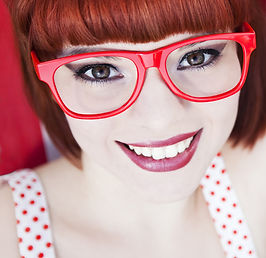 Girl wearing red glasses