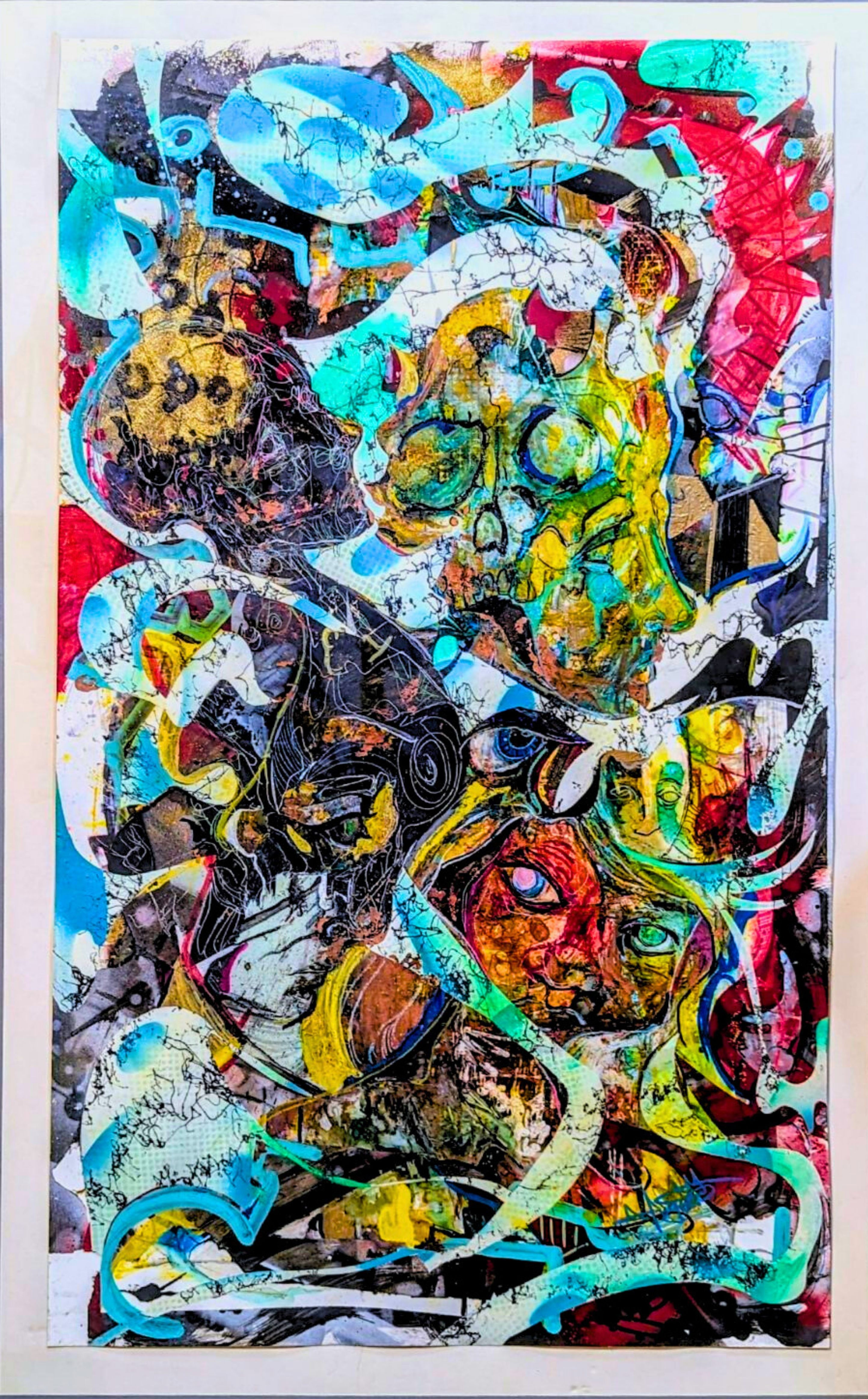 mixed-media collage featuring a green skull, teal swirls, and layered faces in a silver frame
