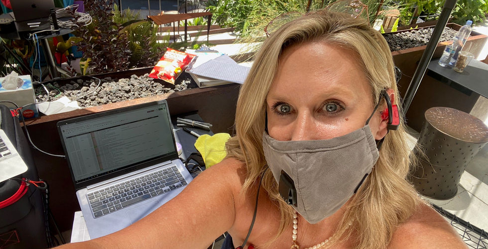 Laurel McFarlane in masks directing Pride Live