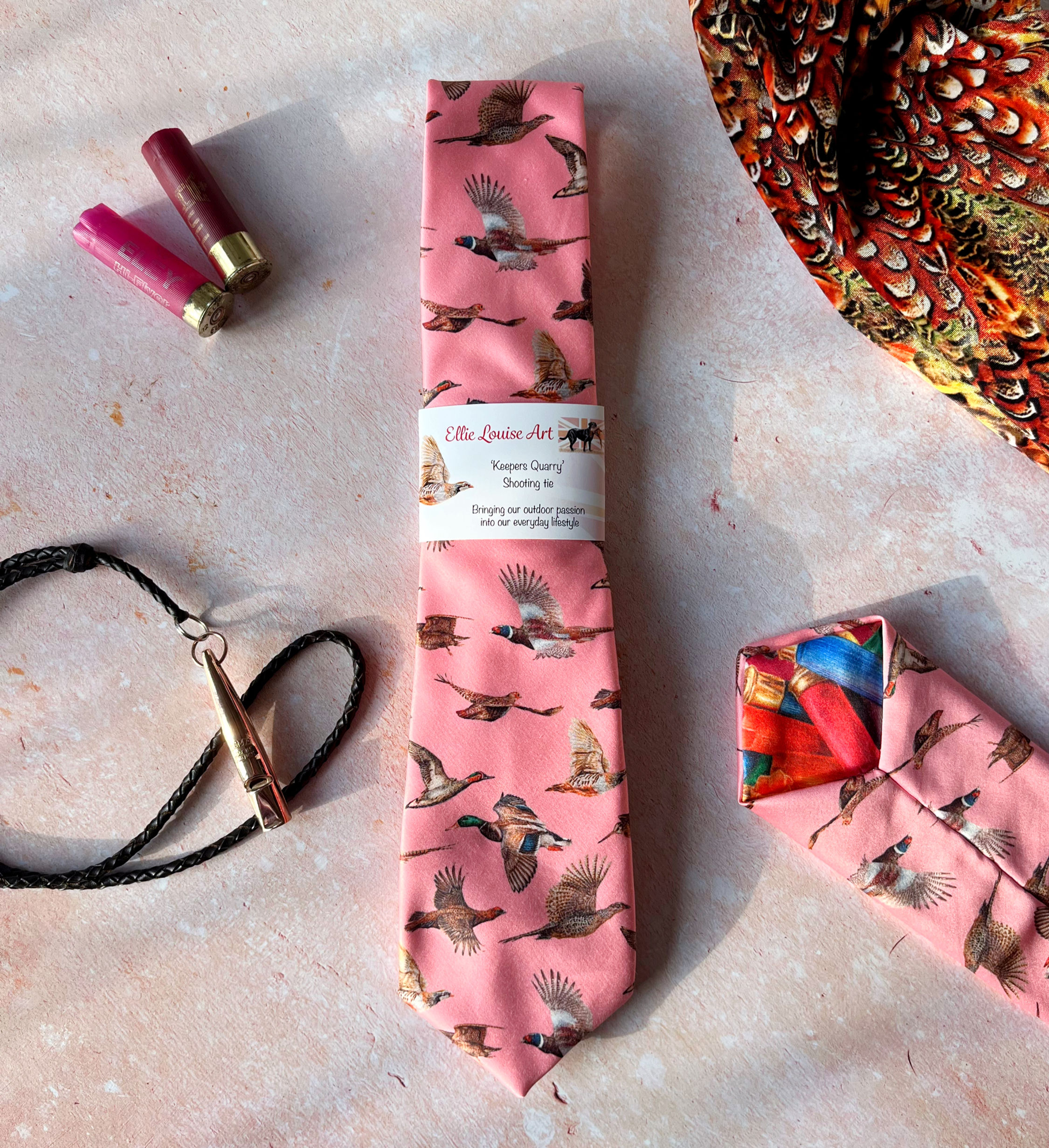 Unisex Pink hand drawn Game bird tie, showing intricate details on front and back in its packaging.