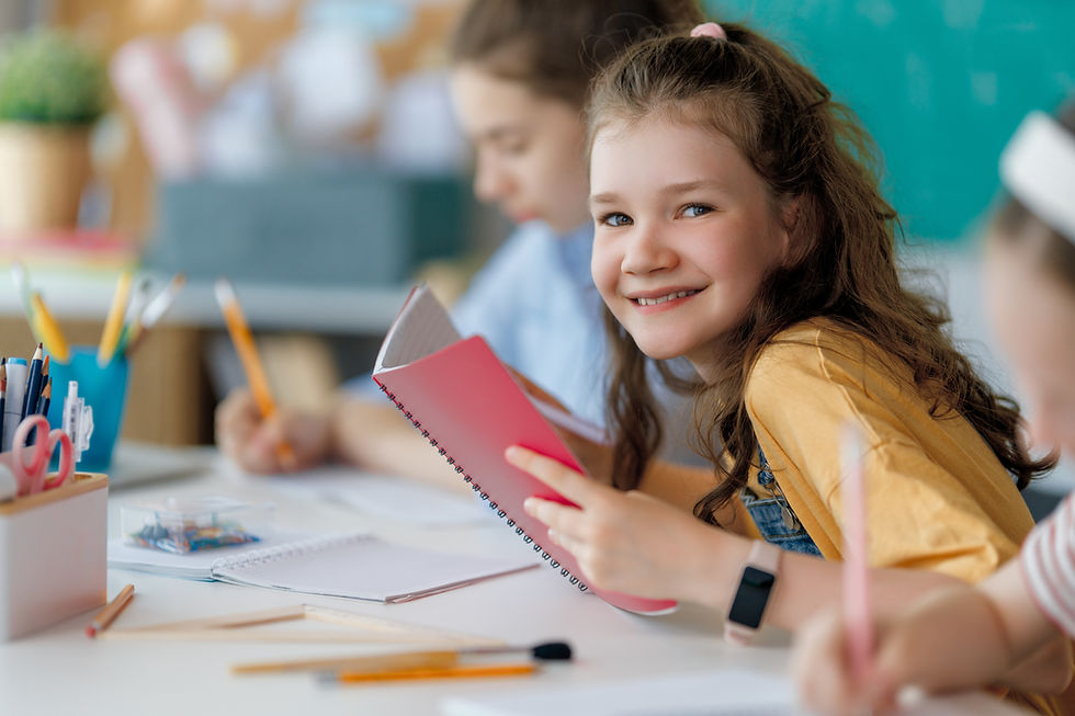 Happy kids at school Children are learning in the class.jpg
