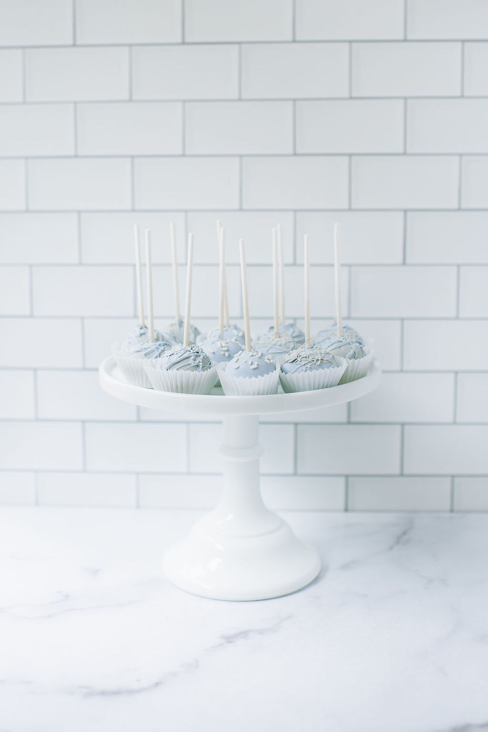 Thumbnail: Dusty blue and gray baby boy cake pops