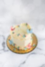 Thumbnail: Vintage lambeth heart butterfly themed gender reveal cake