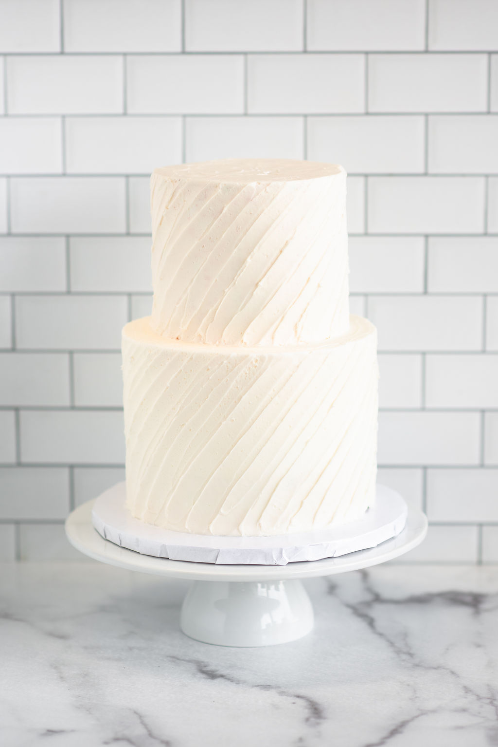 2-tiered horizontal pleated wedding cake for weddings or bridal showers
