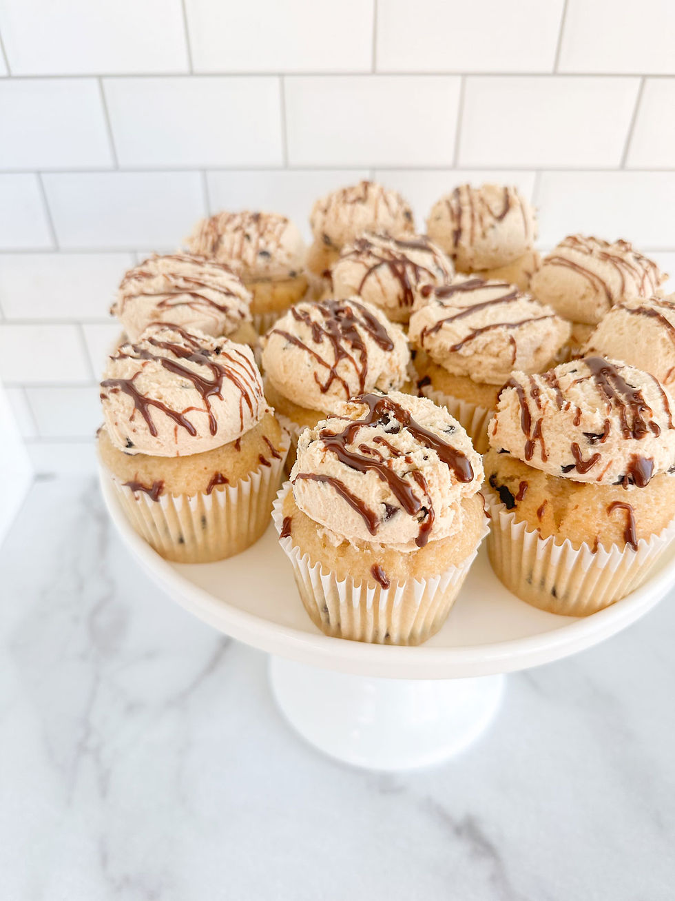 Chocolate cookie dough cupcakes made with cookie butter buttercream