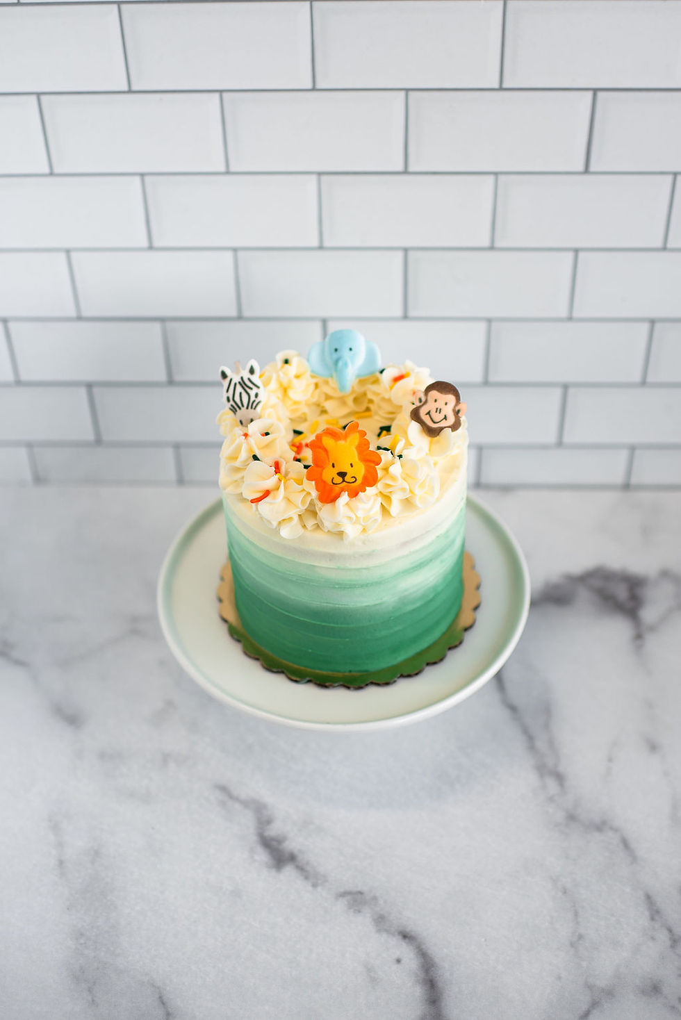 Jungle themed smash cake for baby's first birthday
