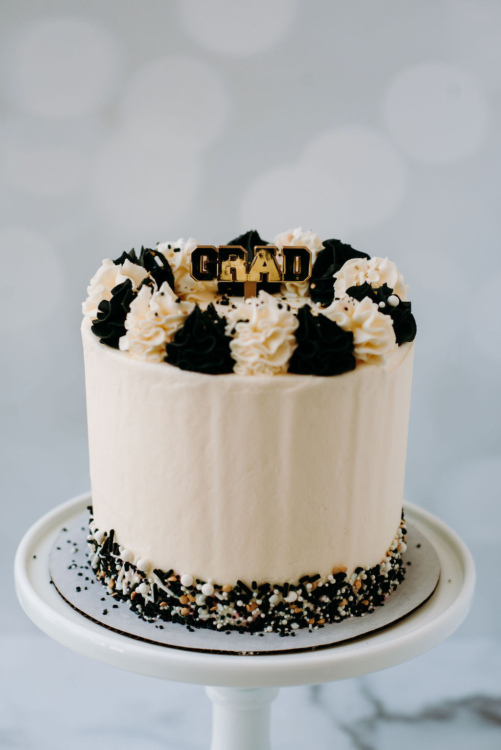 Custom buttercream graduation themed cake from Seatown Sweets