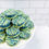 Thumbnail: Seahawk themed chocolate dipped Oreo cookies in Seahawk themed blue and green colors.