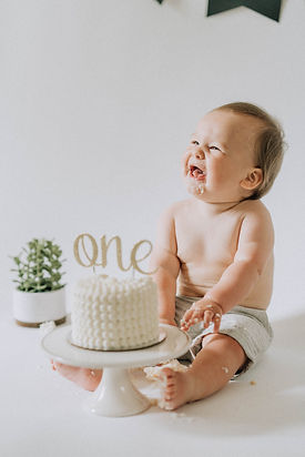 First Birthday Cake and a Baby