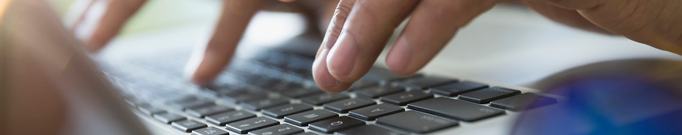 Person typing on computer