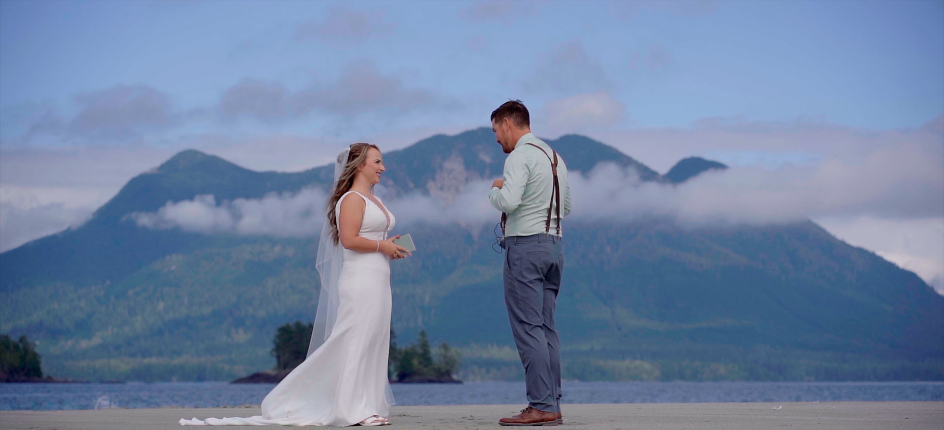 Bride and groom exchanging vows on the beach at Tofino, Vancouver Island