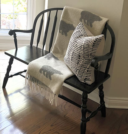 We painted and dressed this existing wood love seat bench to welcome guests into their home. Interior design and decorating by Caroline Loon Deigns.