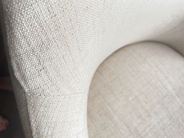 Neutral upholstered counter swivel stool to co-ordinate with the sofa. Design and Decorating by Caroline Loon Designs