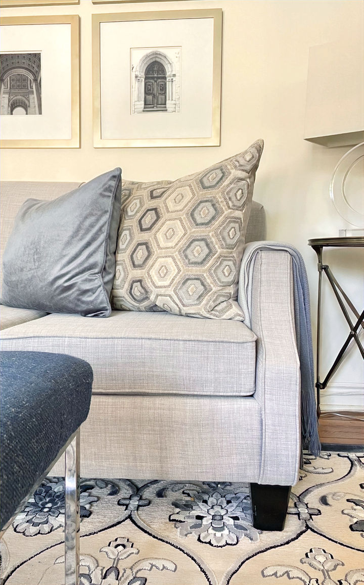 Coordinating area rug, sofa and pillows for this livable luxury gamily room space. Design and decorating by Caroline Loon Designs
