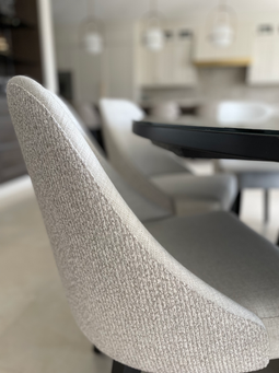 These custom dining chairs fabrics were sourced because of the fabulous colour, texture and durability. Design by Caroline Loon Designs