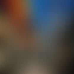 Rainbow-colored banners between buildings in a shopping area