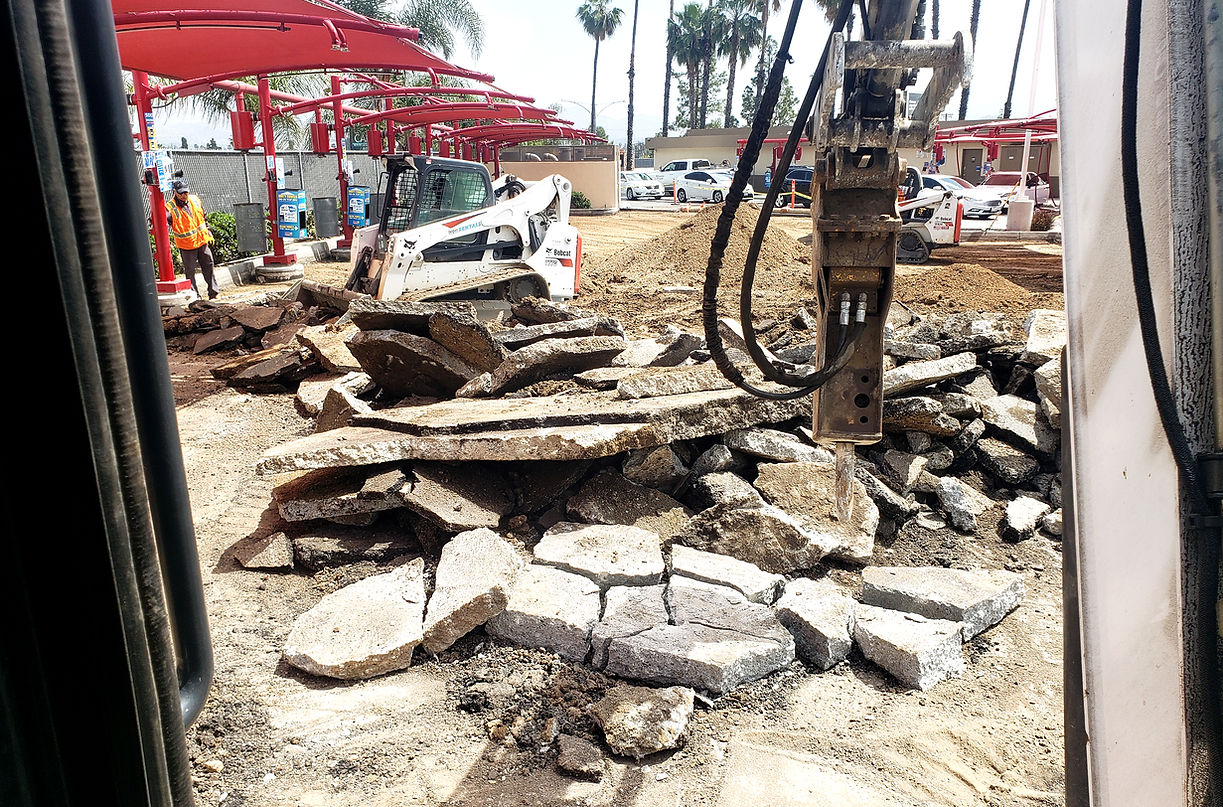 Excavation site with exposed soil layers for foundation preparation.