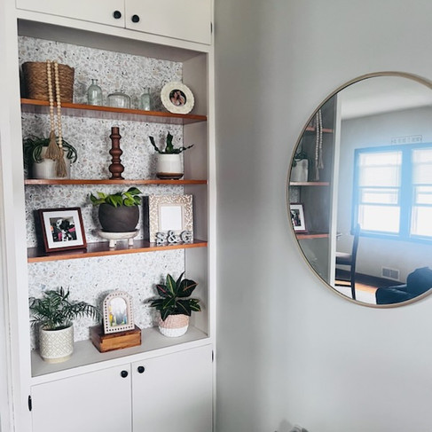 built in cabinet white with wood shelves and backsplash