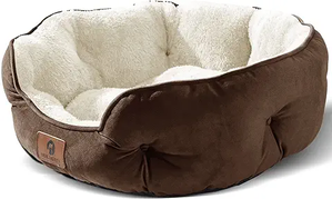 brown dog bed with cream lining