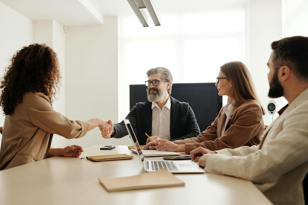 Couple participating in divorce mediation with a licensed clinical social worker in a calm, supportive setting