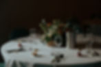 A table set up at a wedding at the Barn