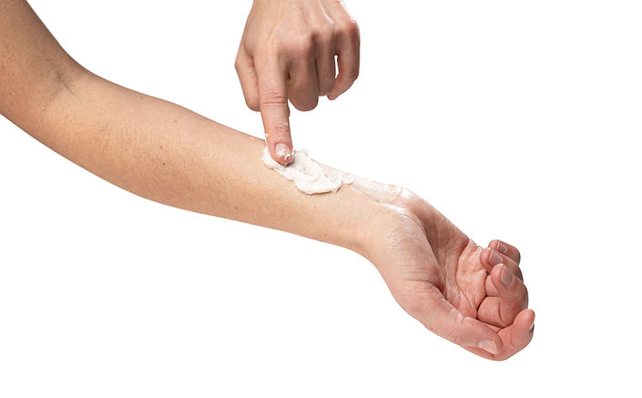 woman applying lotion cream tallow body butter to her skin