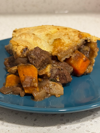 A hearty, chicken & mushroom stew with rosemary-lemon dumplings.