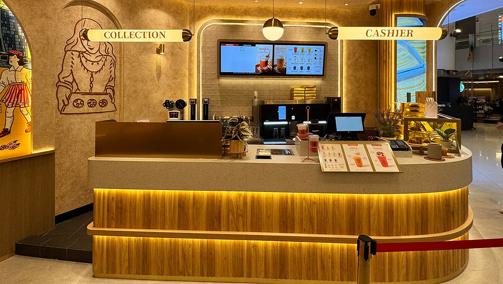 Beverage equipment integrated into a Singapore mall bakery counter.