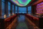 Dimly lit bar with red stools, glowing candles, and colorful ceiling lights. Large windows reveal an evening view, creating a cozy atmosphere.
