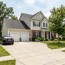 How Professional Driveway Washing Restores Curb Appeal