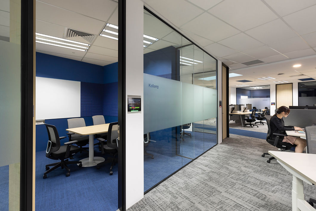Meeting room frontage in the Kuehne+Nagel workplace interior.