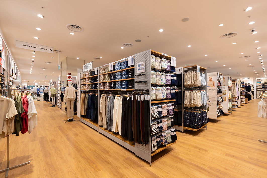 Apparel display area in the Uniqlo retail interior.
