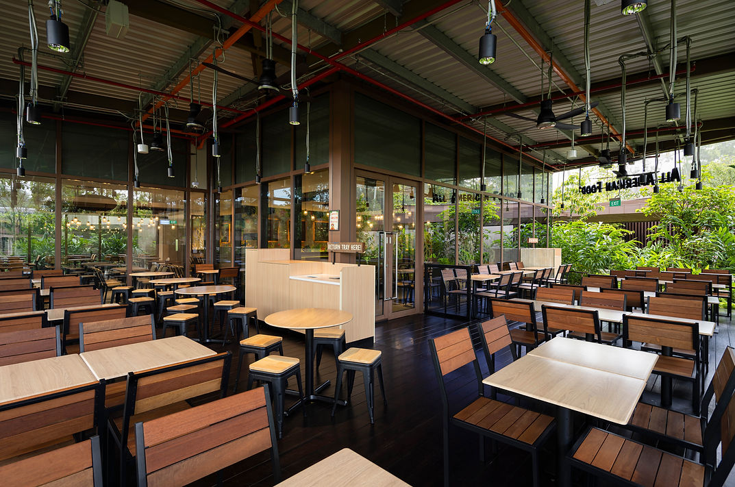 Semi-outdoor seating area in the A&W interior.