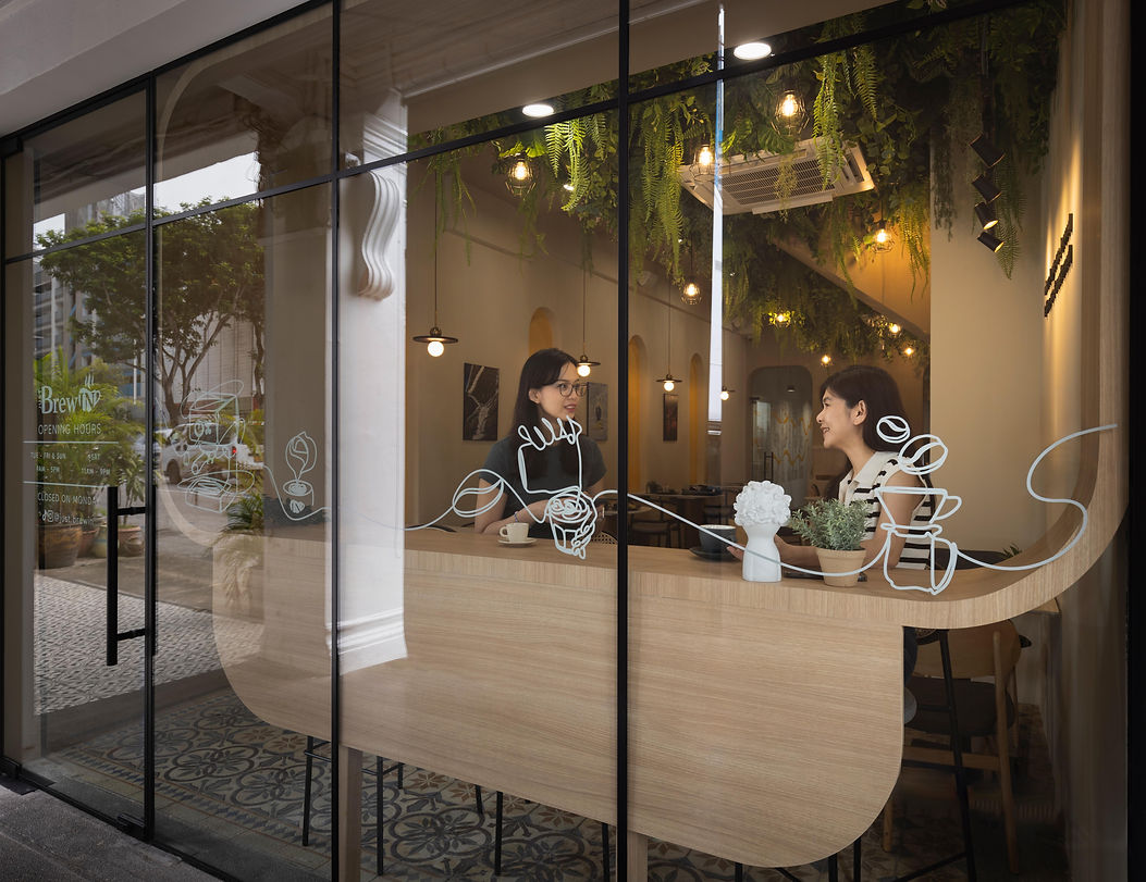 Storefront view of the Just BrewIN interior.
