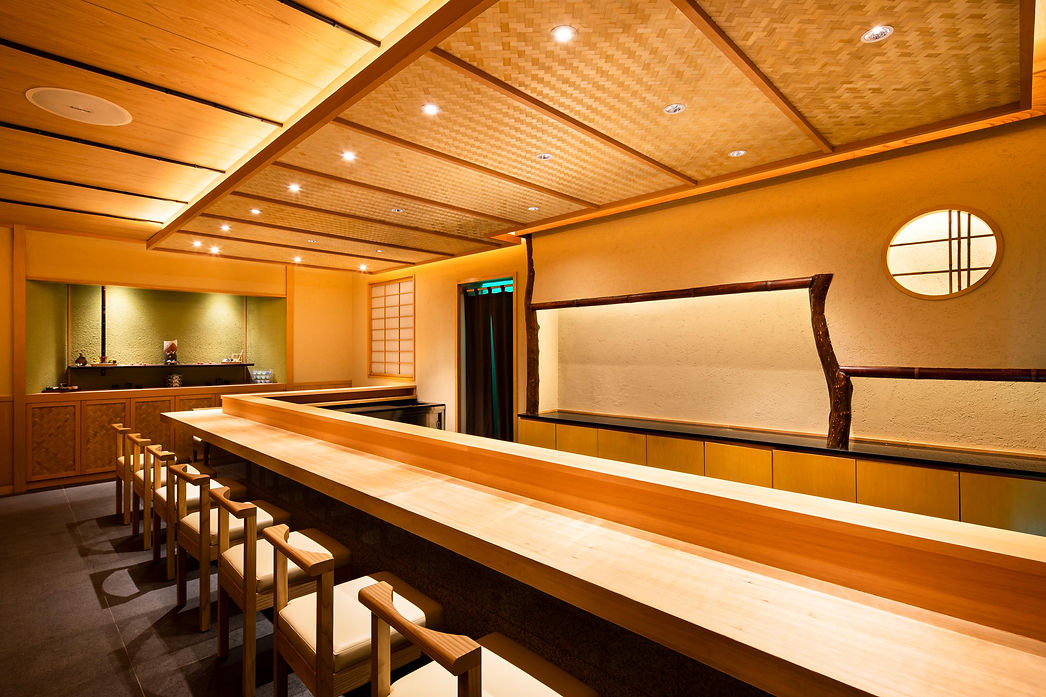 Chef counter seating area in the Kisho interior.