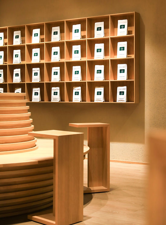 Feature shelving detail in the Suzuki Coffee interior.