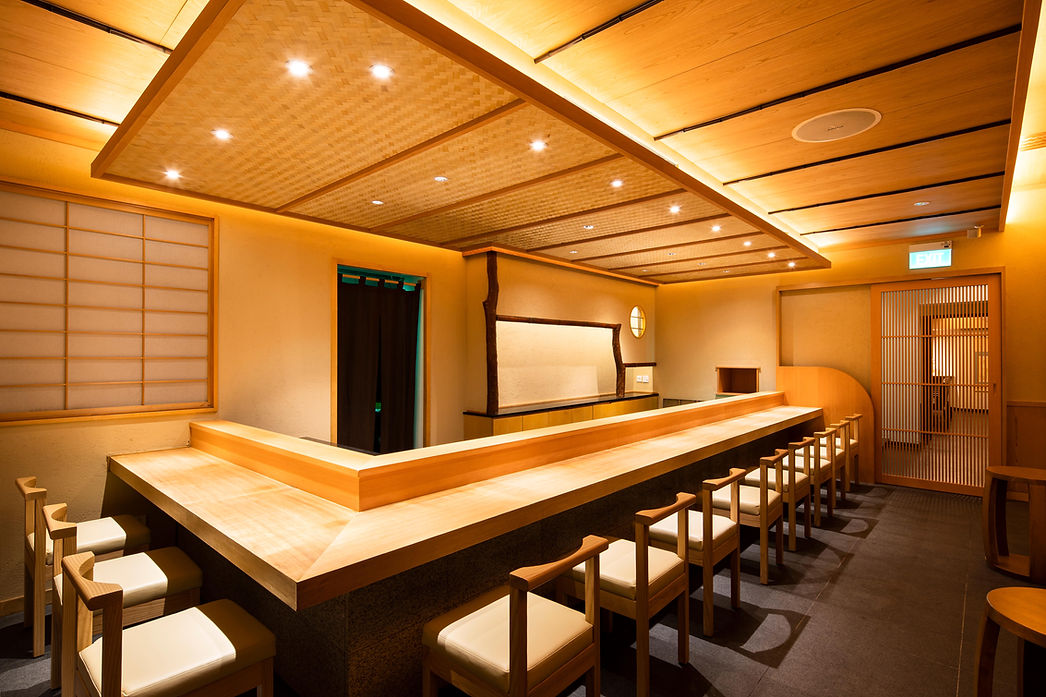 Main counter dining view in the Kisho interior.