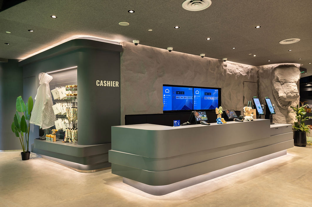 Cashier counter view in the Exploria retail interior.