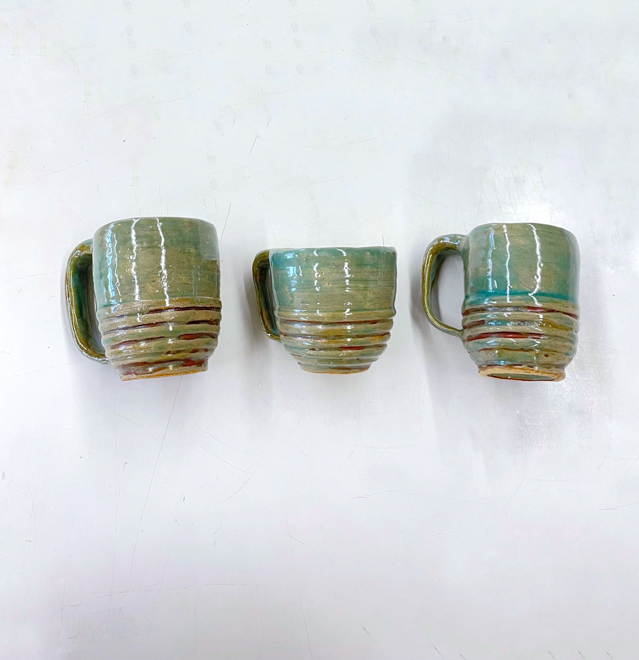 Three Stoneware Cups