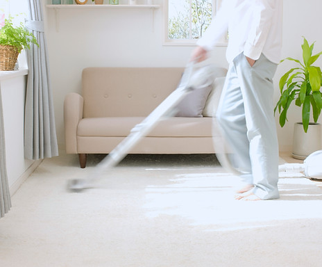 Man Vacuuming
