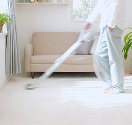 Man Vacuuming