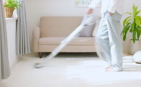 Man Vacuuming