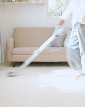 Man Vacuuming