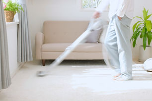 Man Vacuuming