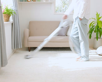 Man Vacuuming