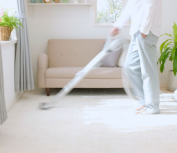 Man Vacuuming