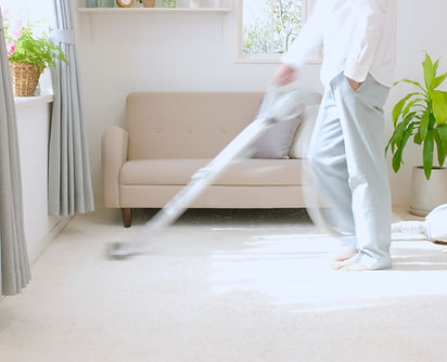 Man Vacuuming