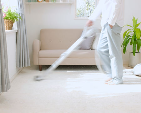Man Vacuuming